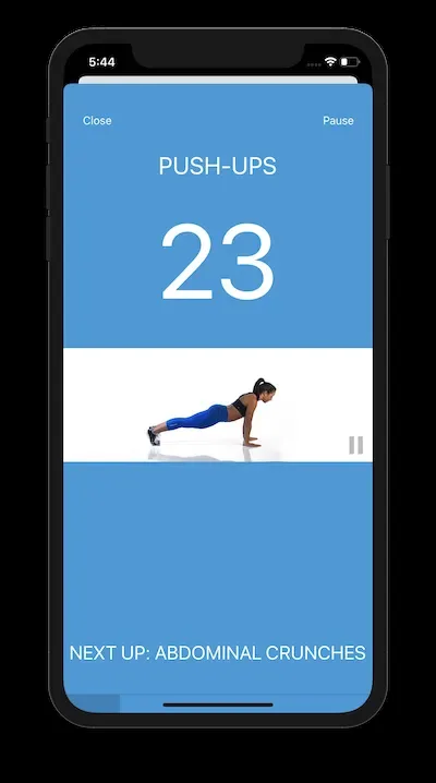 Workout screen showing a video demo of push-ups below the countdown timer